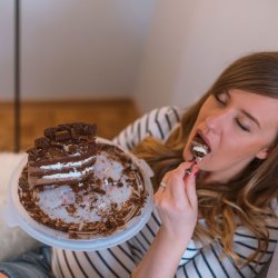 0_Closeup-of-woman-eating-chocolate-cake.jpg