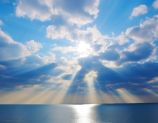pngtree-a-sun-beam-comes-out-of-clouds-over-the-ocean-image_13158291.png