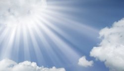sun-rays-coming-out-of-the-clouds-in-a-blue-sky-sustainable-use-of-light.jpg