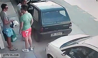 1442857022_man_pushes_car_out_of_parking_lot.gif