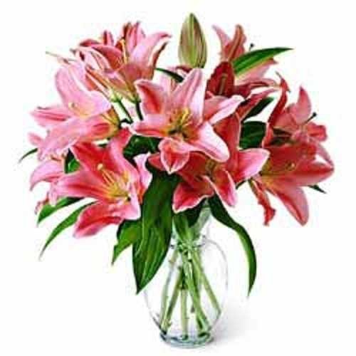 8_stems_of_pink_oriental_lilies_in_glass_vase.jpg