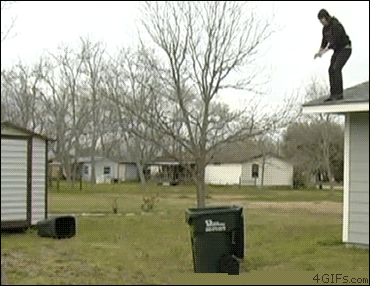 funny-man-jumping-roof-building-bin-trash-miss-animated-gif.gif
