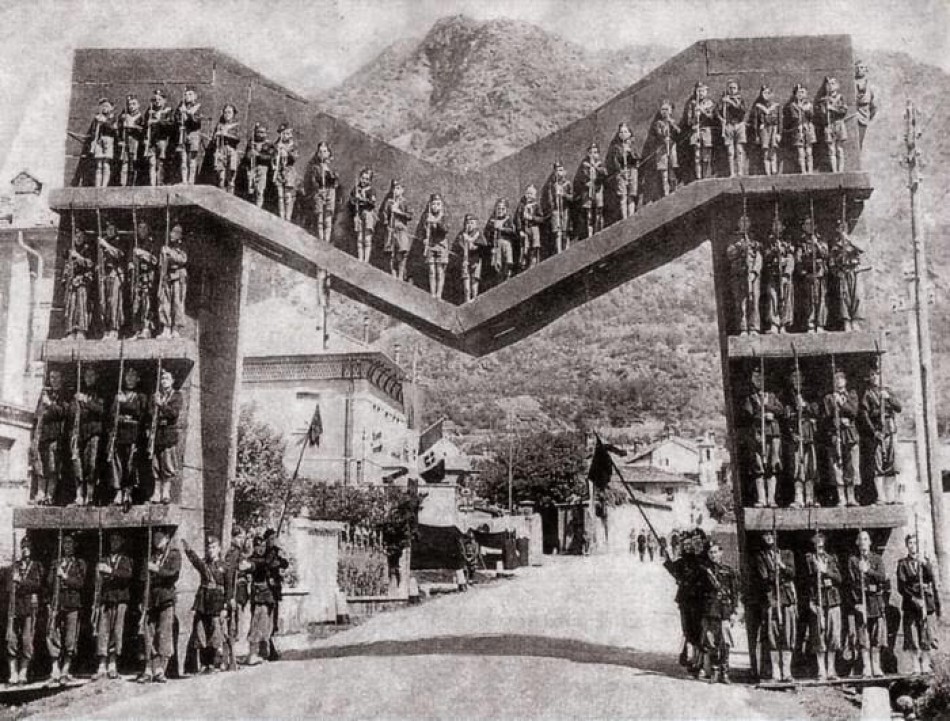 Reception-of-Mussolini-with-a-giant-M-in-a-small-village-in-Piemonte-1928.jpg