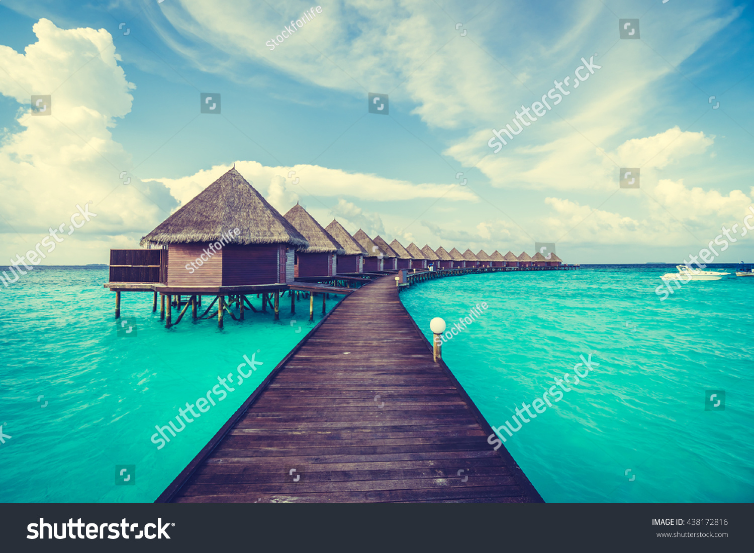 stock-photo-beautiful-tropical-maldives-resort-hotel-and-island-with-beach-and-sea-on-sky-for-holiday-vacation-438172816.jpg