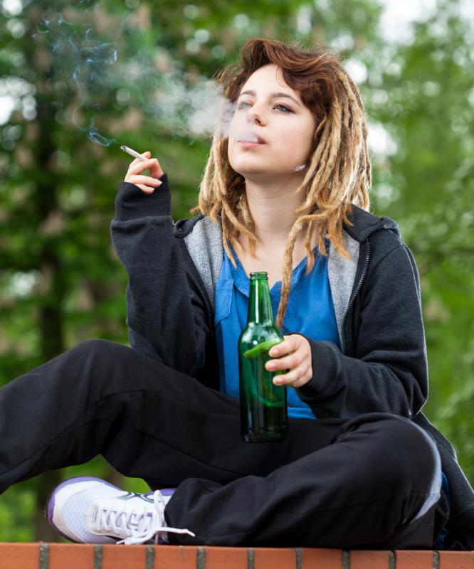 woman-in-sweats-smoking-and-drinking.jpg