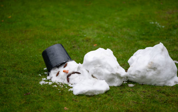 a-melted-snow-man-with-a-sad-face-as-symbol-of-the-end-of-the-winter.jpg
