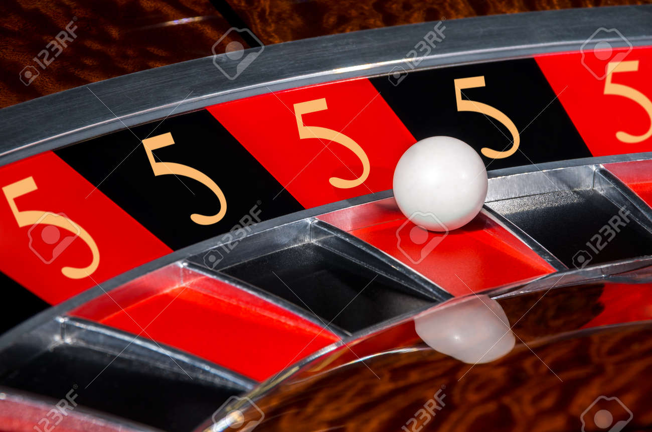 74713385-concept-of-classic-casino-5-lucky-numbers-roulette-wheel-with-black-and-red-sectors-and-white-ball.jpg