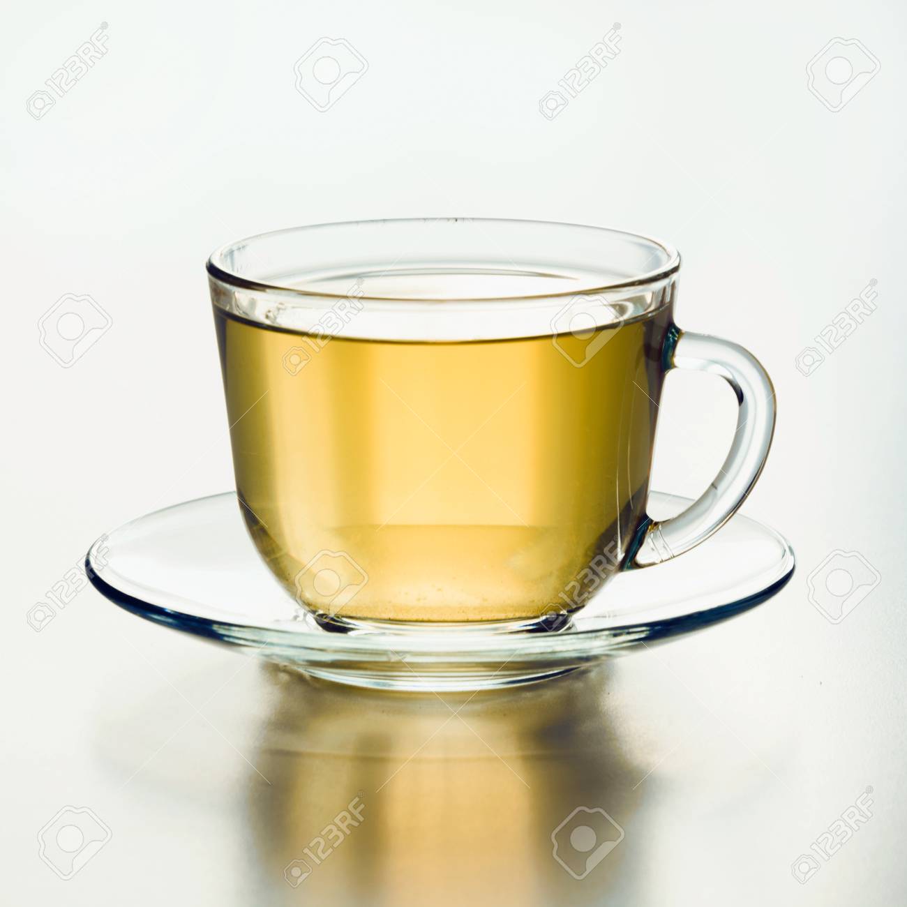 94525172-glass-cup-of-green-tea-close-up-square-image-.jpg