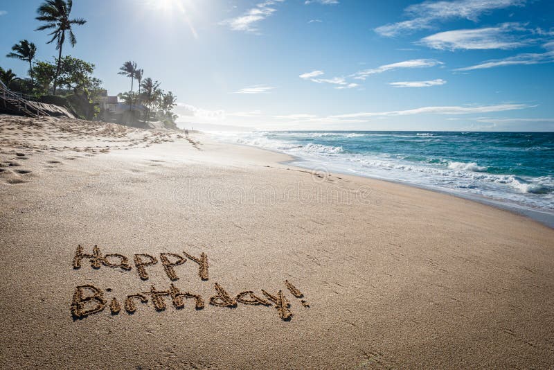 happy-birthday-written-sand-sunset-beach-hawaii-palm-trees-ocean-background-happy-birthday-167863724.jpg