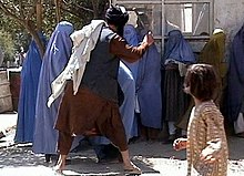 220px-Taliban_beating_woman_in_public_RAWA.jpg