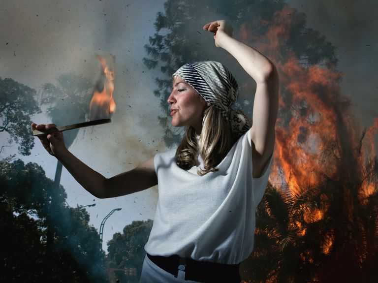 fire-eating-woman-523153638-578947503df78c09e91bea5a.jpg